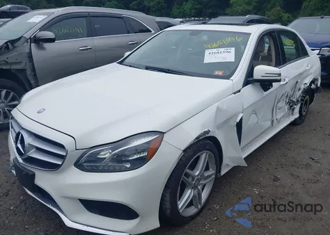 2014 Mercedes-Benz E 350 4Matic z USA, uszkodzony, nr VIN WDDHF8JB7EA832913